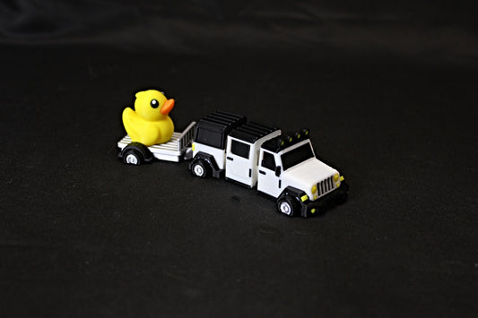 Jeep towing a Duck